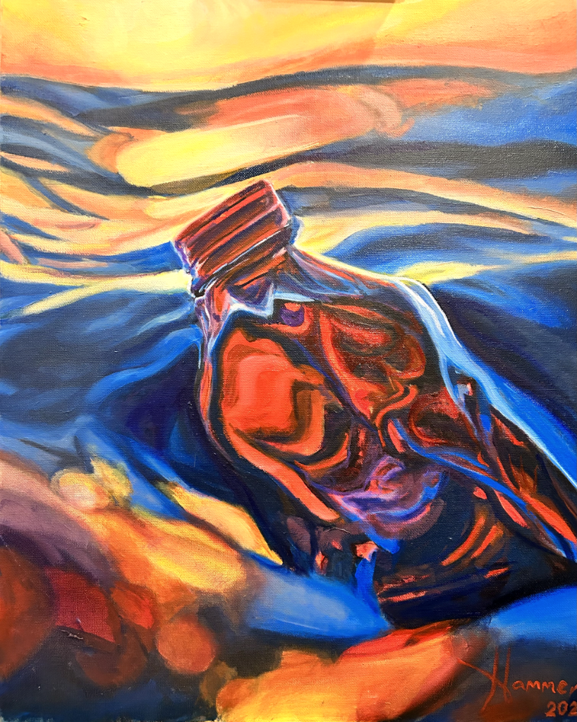 Red plastic bottle adrift in a sunset colored seascape